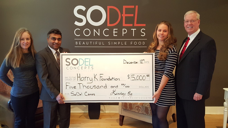 SoDel Cares recently donated $5,000 to the Harry K Foundation, which is helping families and children coping with hunger and food instability in Delaware. Shown are (l-r) Nelia Dolan, marketing director for SoDel Concepts; Harry Keswani, founder and president of the Harry K Foundation; Lindsey Barry, controller for SoDel Concepts; and Tim Buckmaster, Harry K Foundation school outreach chair. SOURCE SUBMITTED